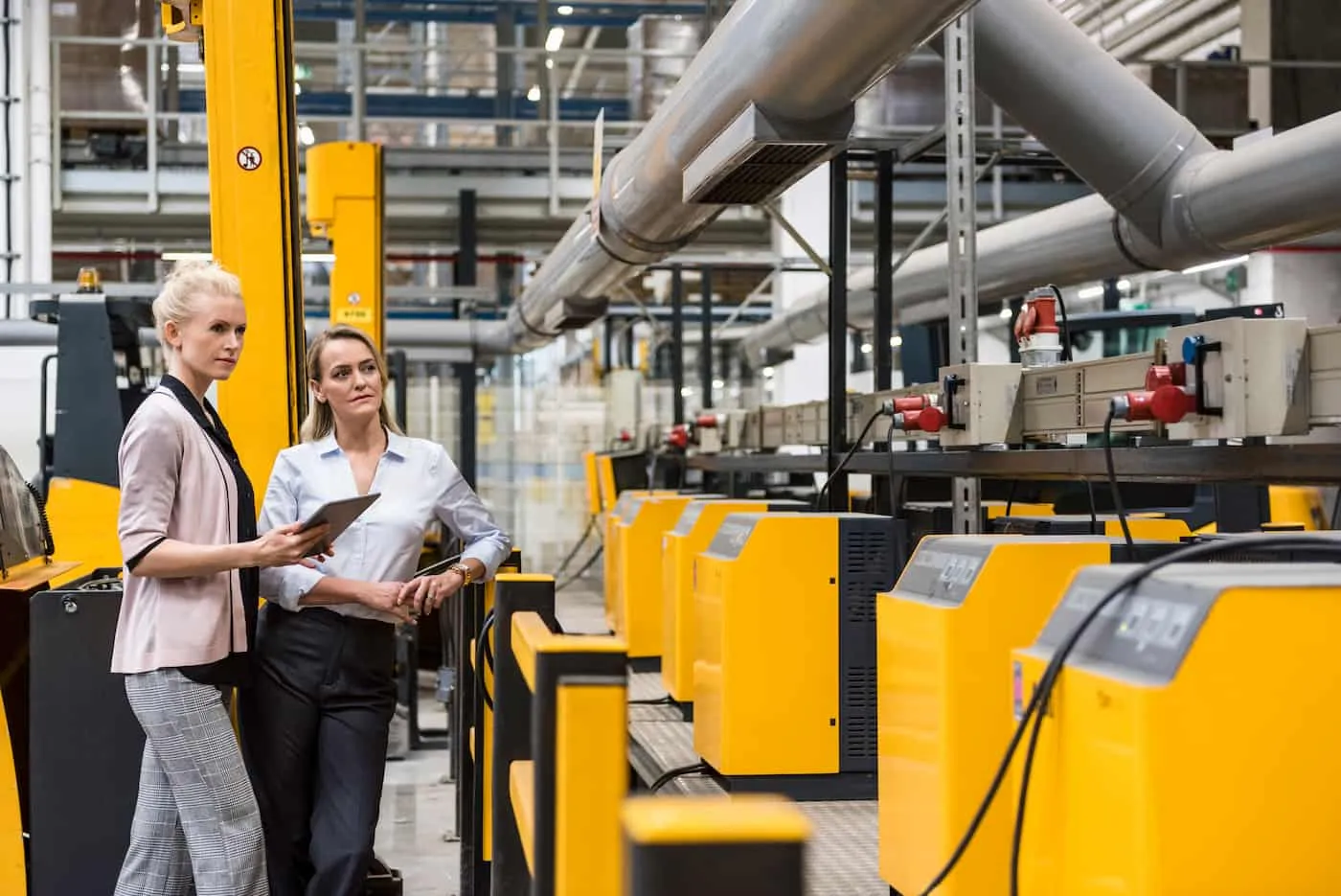Women checking lean manufacturing process.